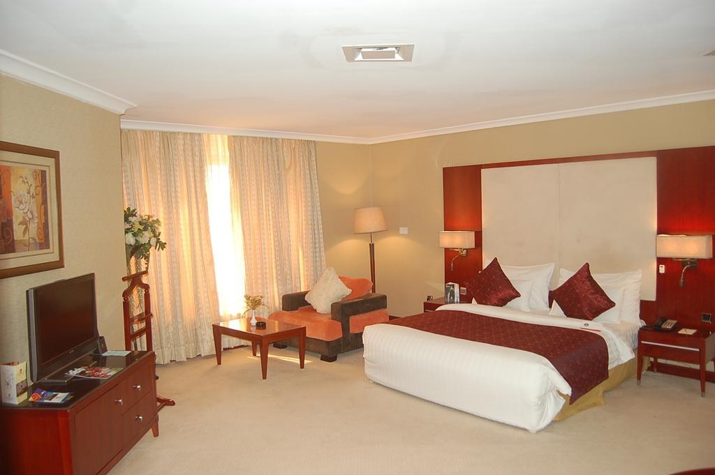 Chelsea Hotel Abuja Szoba fotó