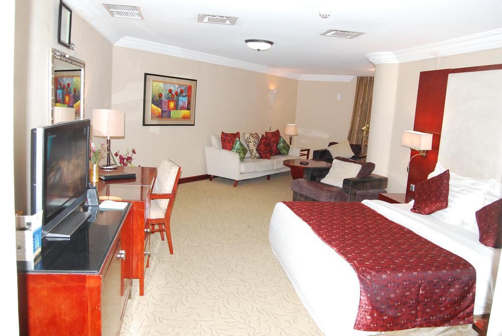 Chelsea Hotel Abuja Szoba fotó